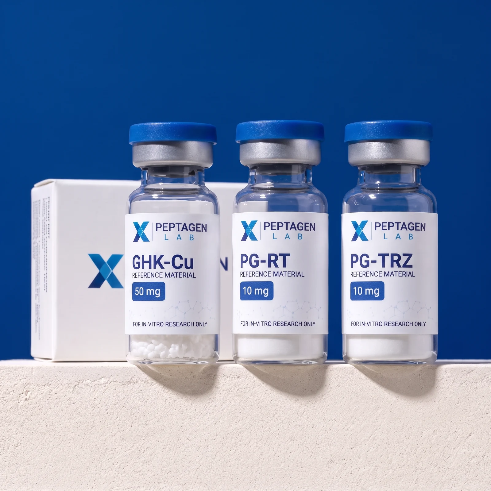 GHK-Cu, PG-RT and PG-TRZ Peptagen Reference Materials with cobalt caps and matte white packaging